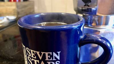 Photo of a full cup of coffee