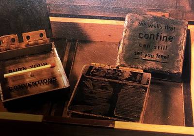 Details of several of the metal matchboxes