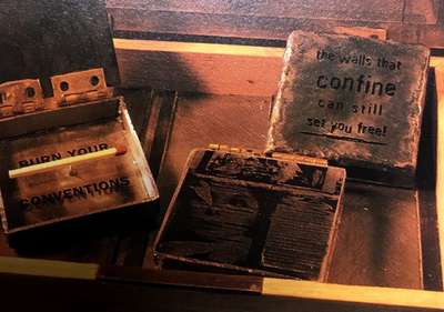 Details of several of the metal matchboxes