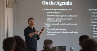 Me standing in front of a screen showing the workshop agenda