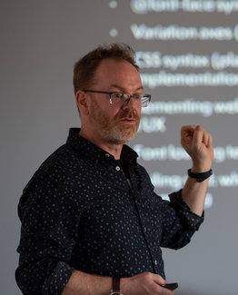 Photo of Jason teaching a workshop